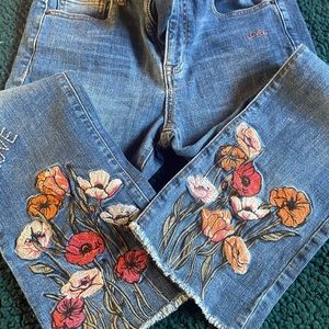 Very cute embroidered sneak peek jeans.